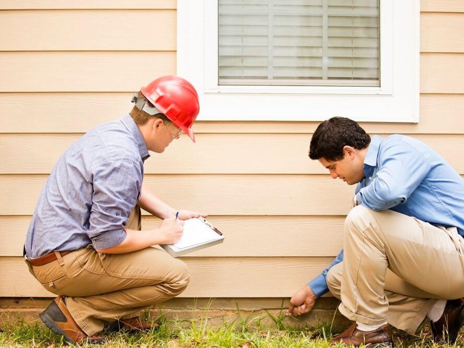 Inspectors check a homes foundation.