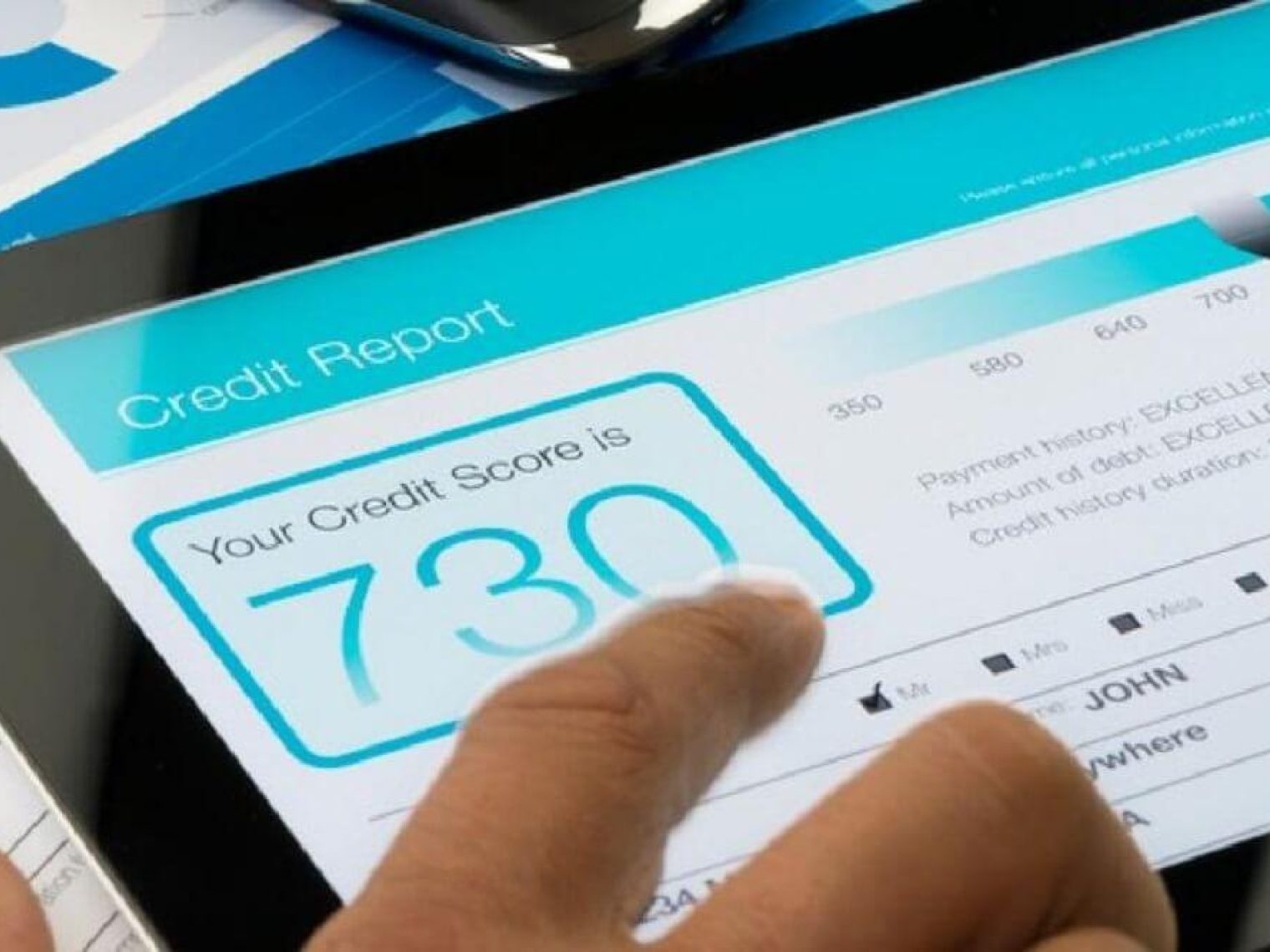 Tablet displaying a credit score website.