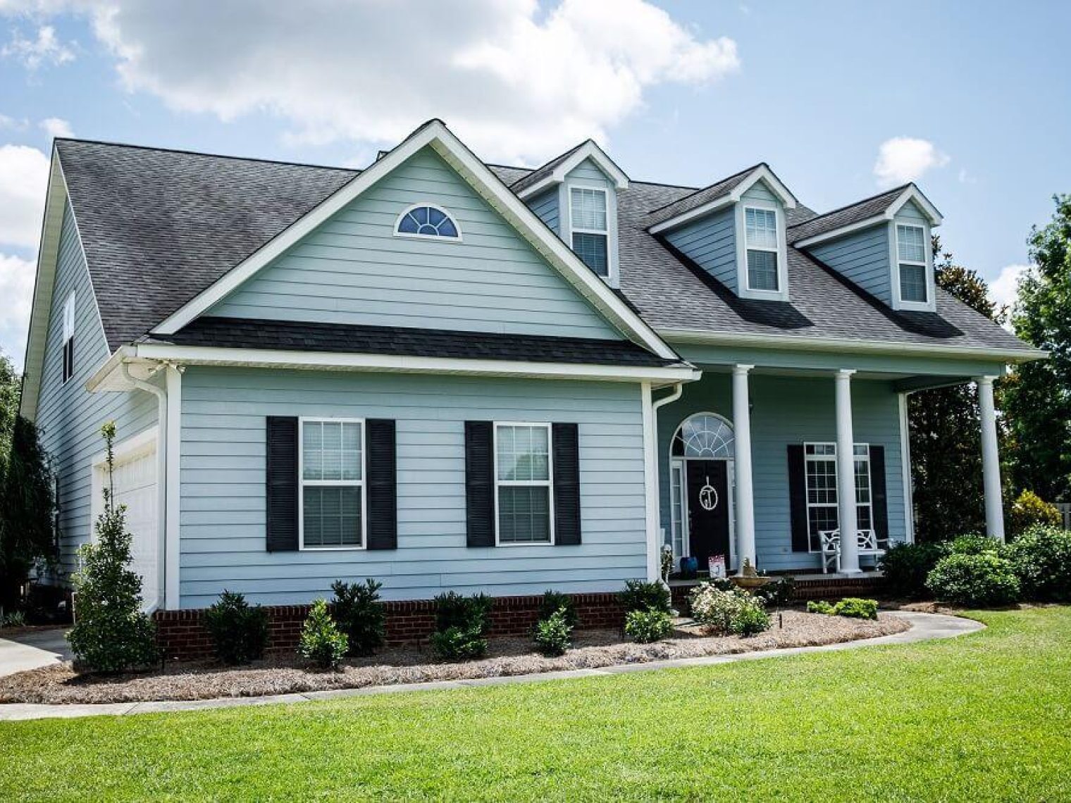 Exterior view of a nice blue house.