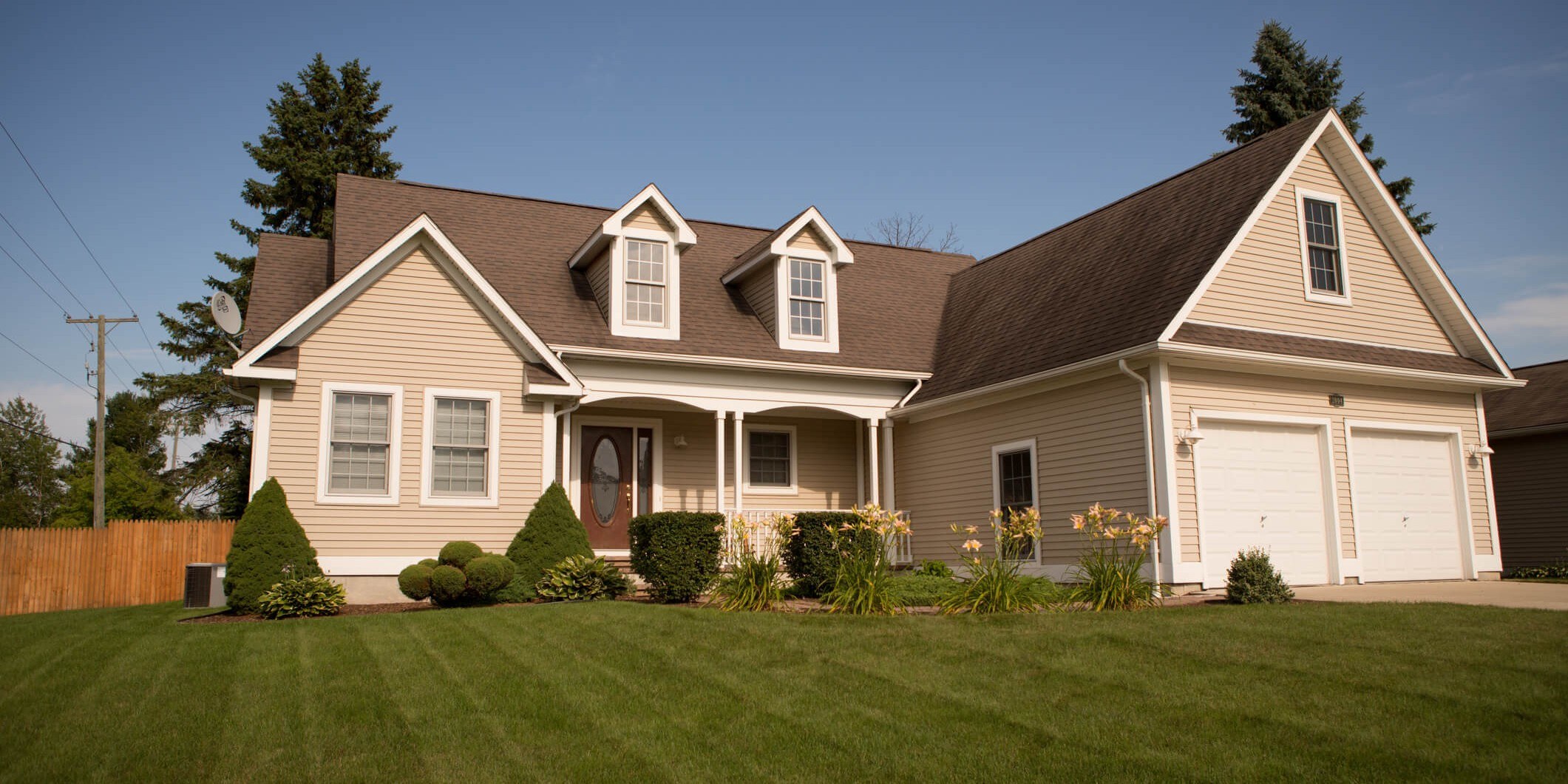 Suburban house with spacious lawn.